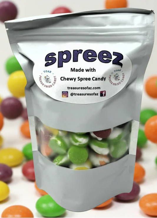 Bag of freeze-dried chewy Spree candy with colorful candy pieces in background